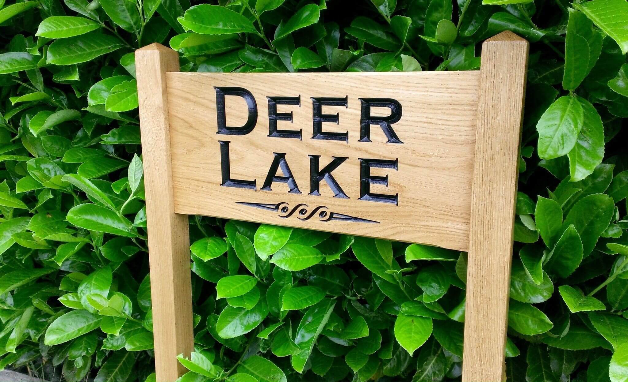 Medium Ladder Sign with deer lake engraving underlined with a scroll