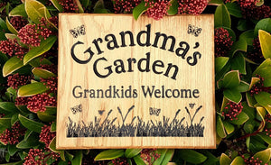 Square House Name Plate saying grandmas garden grandkids welcome with a grass and butterfly picture FONT: EDWARDIAN
