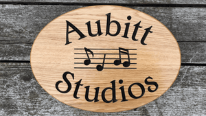 Aubitt Studios musical note oval shaped sign