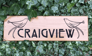 Craigview two birds Perched on engraved text solid oak house sign
