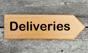 Deliveries Sign pointing towards the right