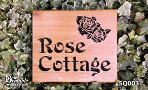 Square House Plaque saying rose cottage with a rose image FONT: VICTORIAN