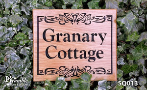 Square House Name Plate saying granary cottage with a boarder and scroll FONT: GOUDY OLD