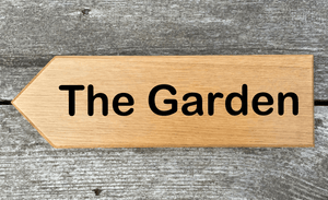 The Garden Sign pointing towards the Left