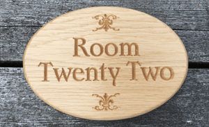 Room Twenty Two Solid Oak Oval Sign for Hotels, Convention centres, Bed & Breakfast room number sign