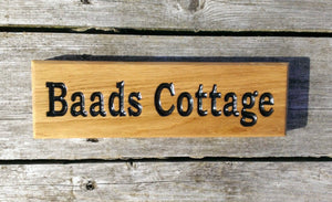 Small Thin House Sign saying baads cottage FONT: BOOKMAN