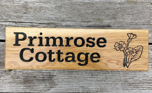 Small Thin House Name Plate saying primrose cottage with a primrose picture FONT: BOOKMAN